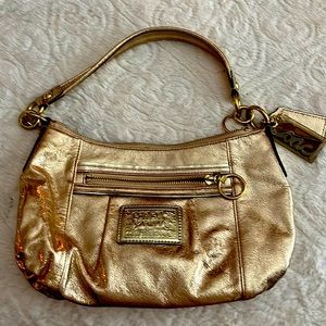 Authentic Coach Heart Poppy gold handbag